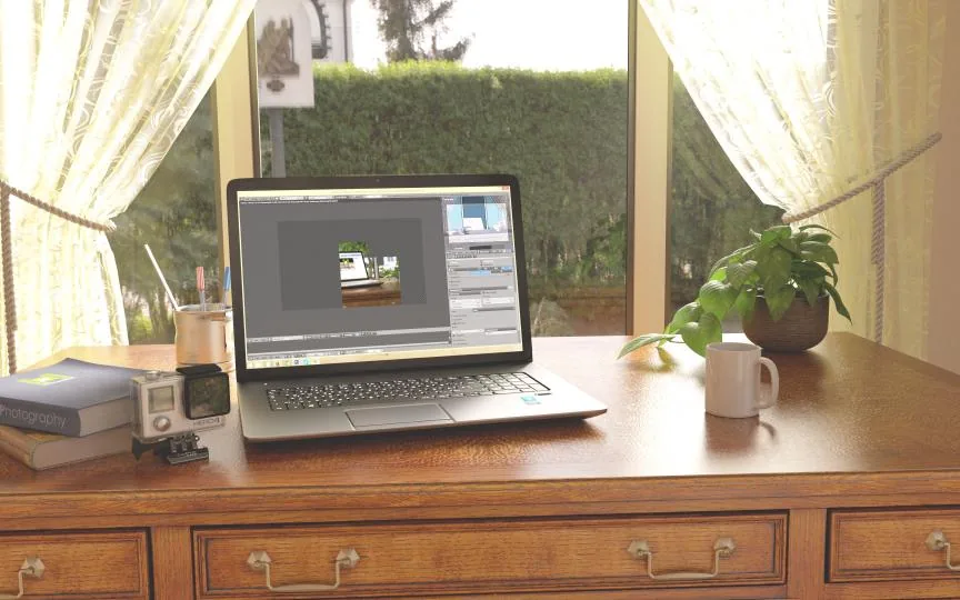 Laptop running Windows on a desk, illustrating Windows 10 end of support